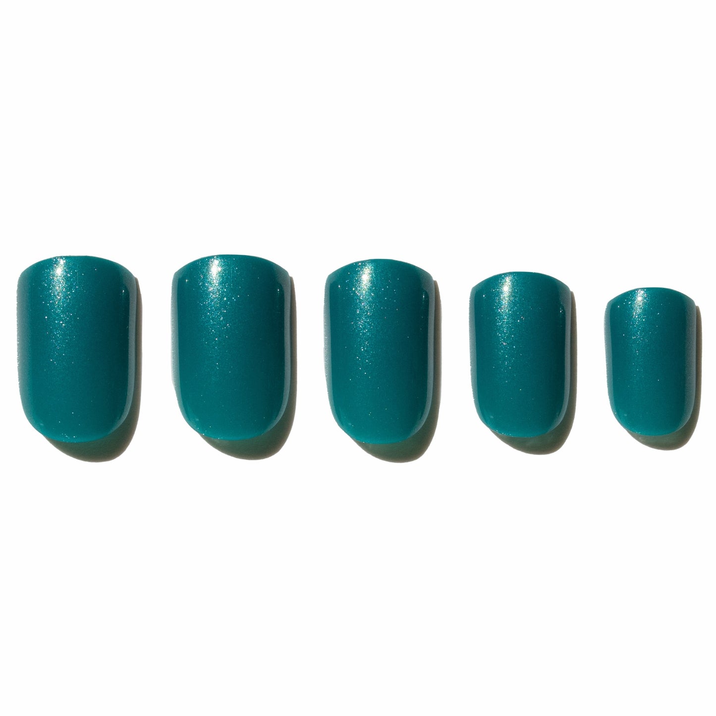 Five teal press on nails a white background