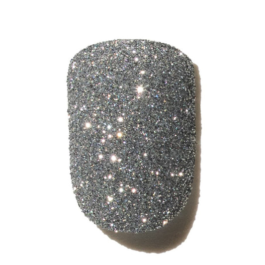 Silver Glittery press on nail on a white background