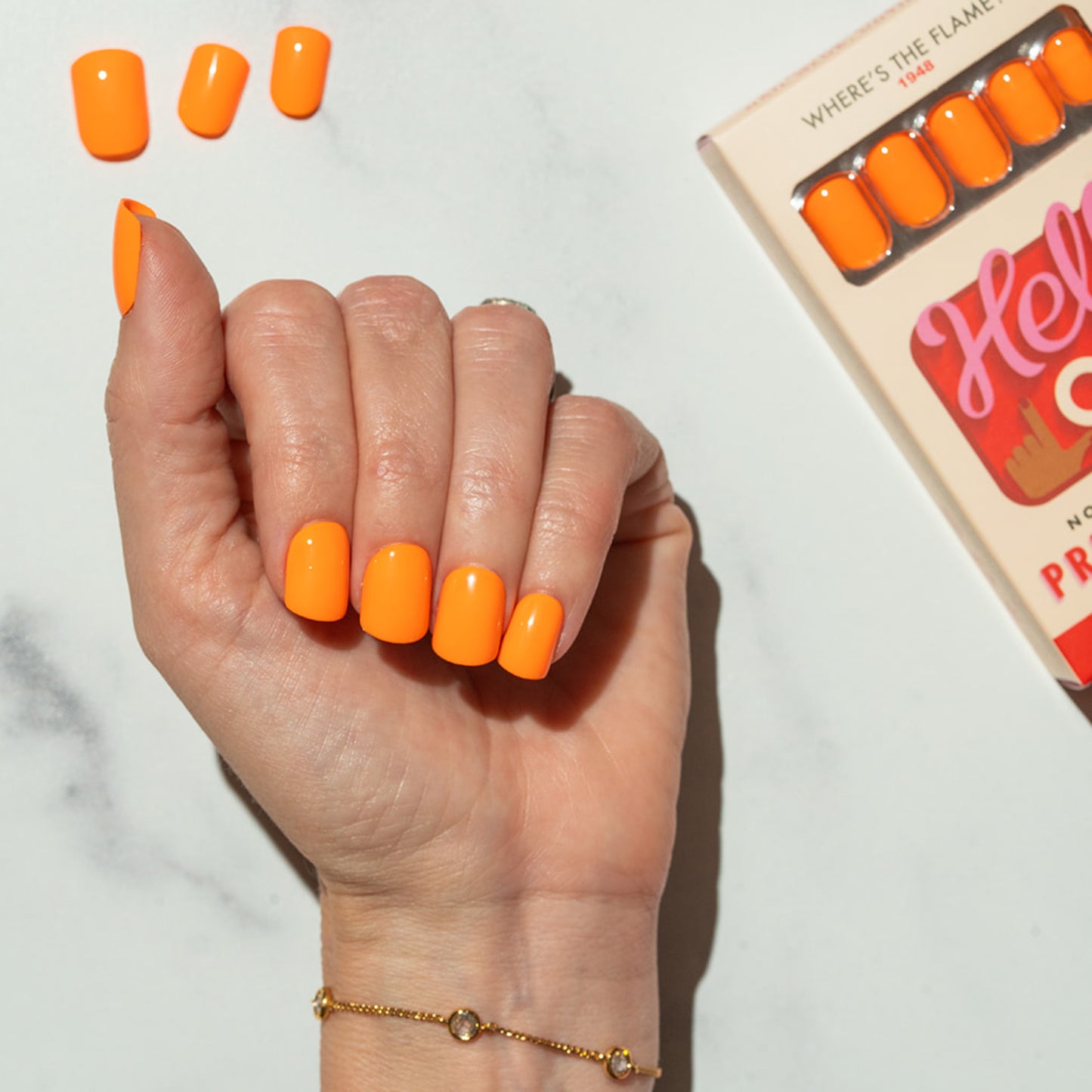 orange press on nail WTF