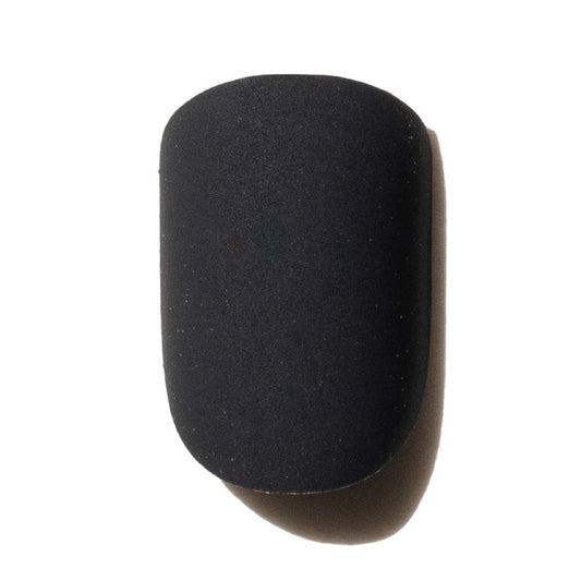 matte black press on nail on a white background