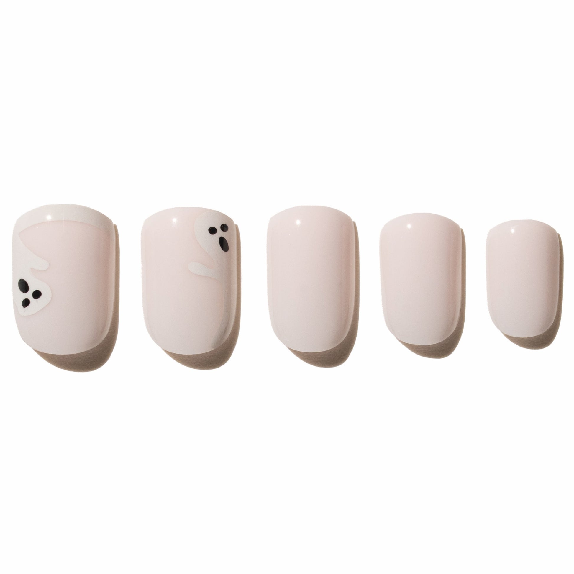 Five white ghost press on nails on a white background