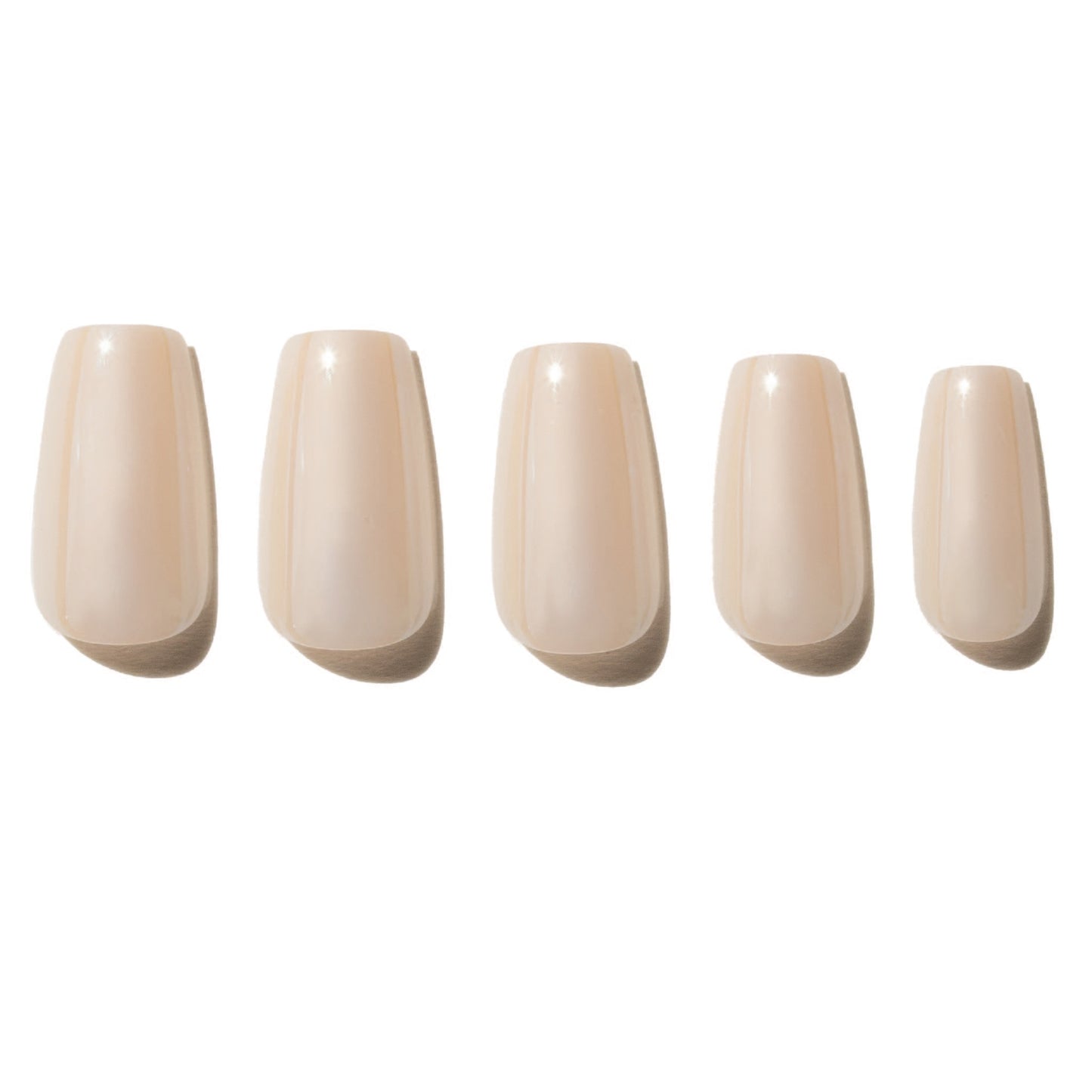 Five off white press on nails on a white background
