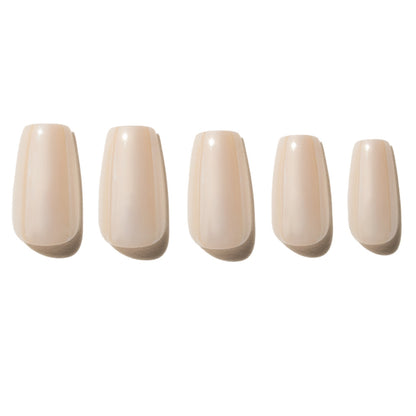 Five off white press on nails on a white background