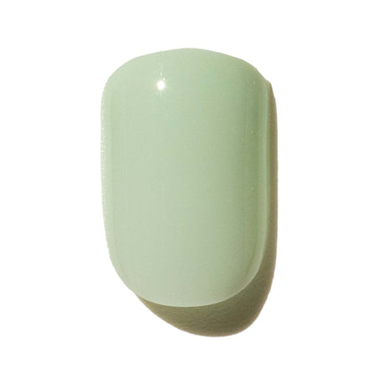 Light green press on nails on a white background