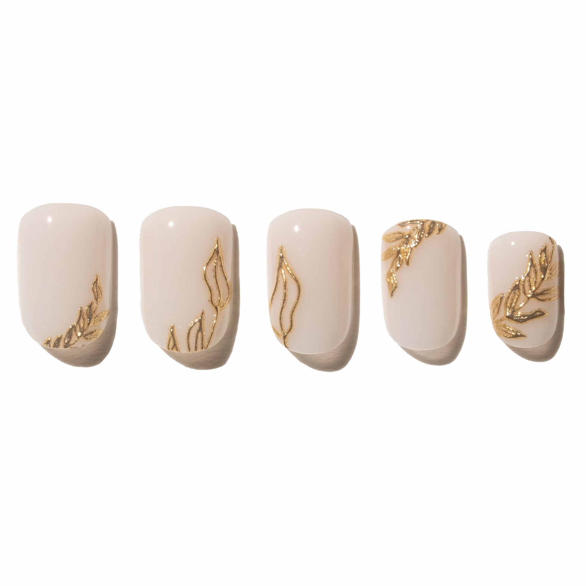 Five milky white press on nails with gold leaf accents on a white background KKU