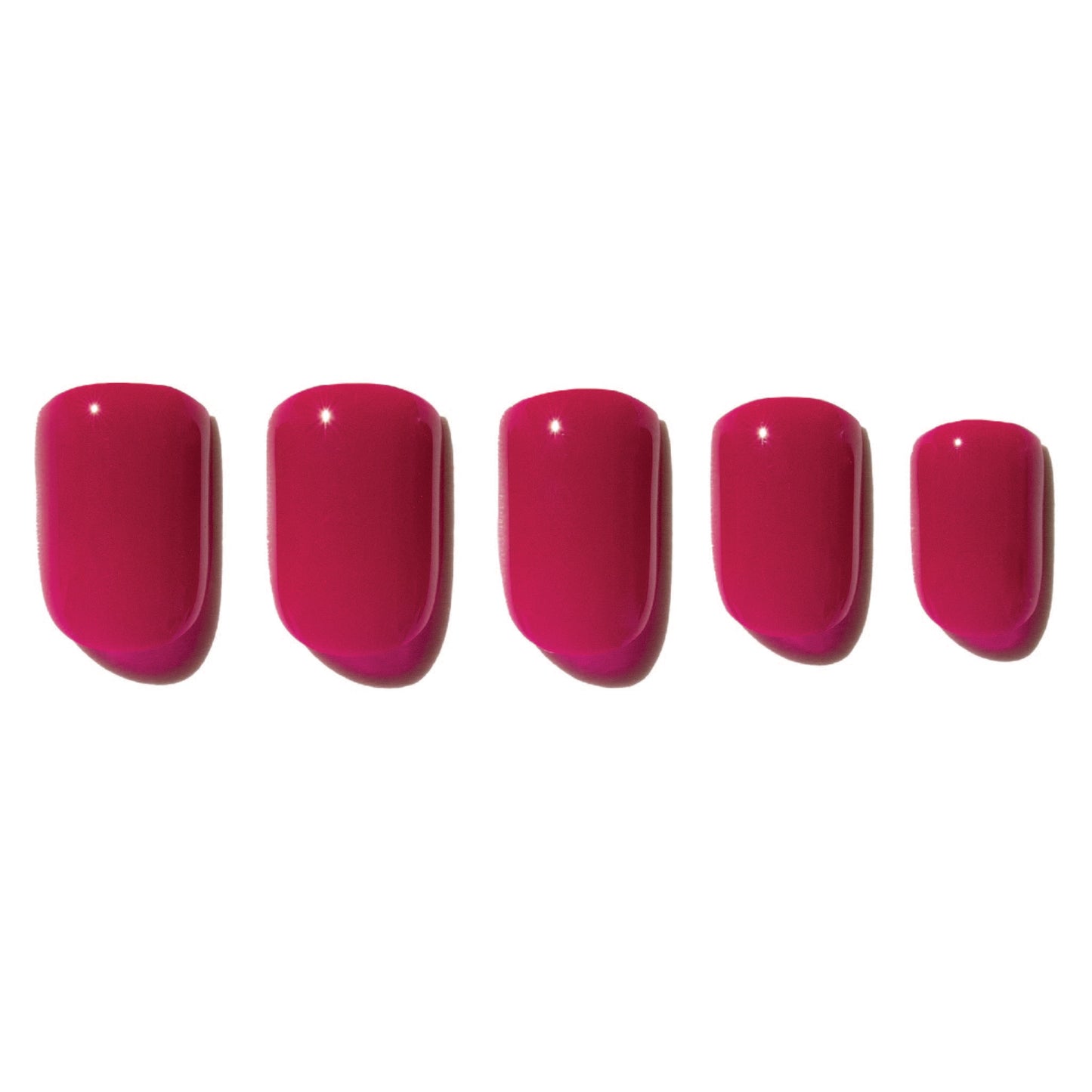 Five pink press on nails on a white background