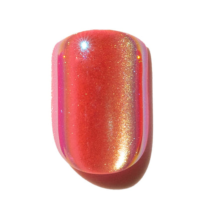 Shimmering pink press-on nail with a oill slick finish and subtle iridescent sparkle