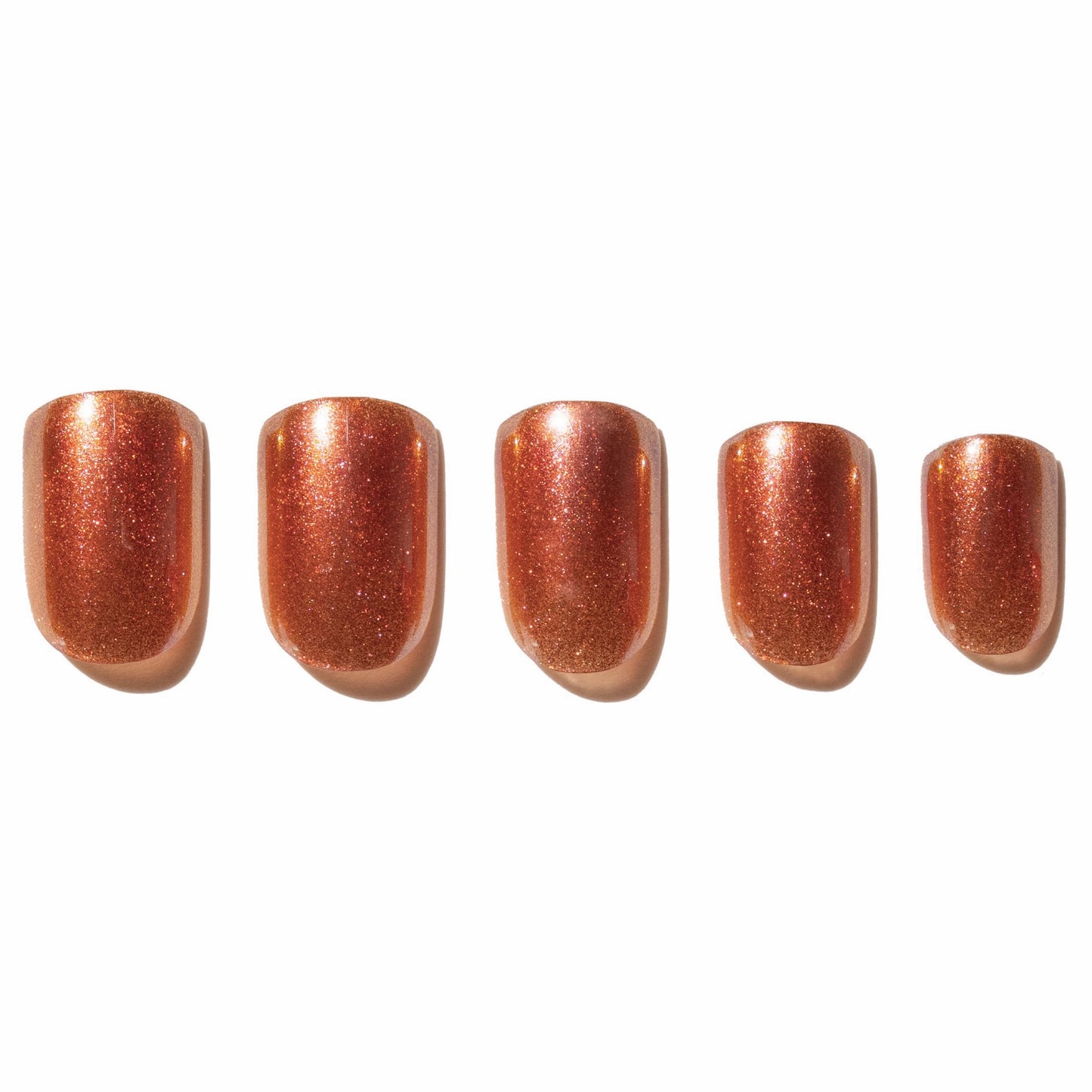 Set of five rose gold press on nails on a white background