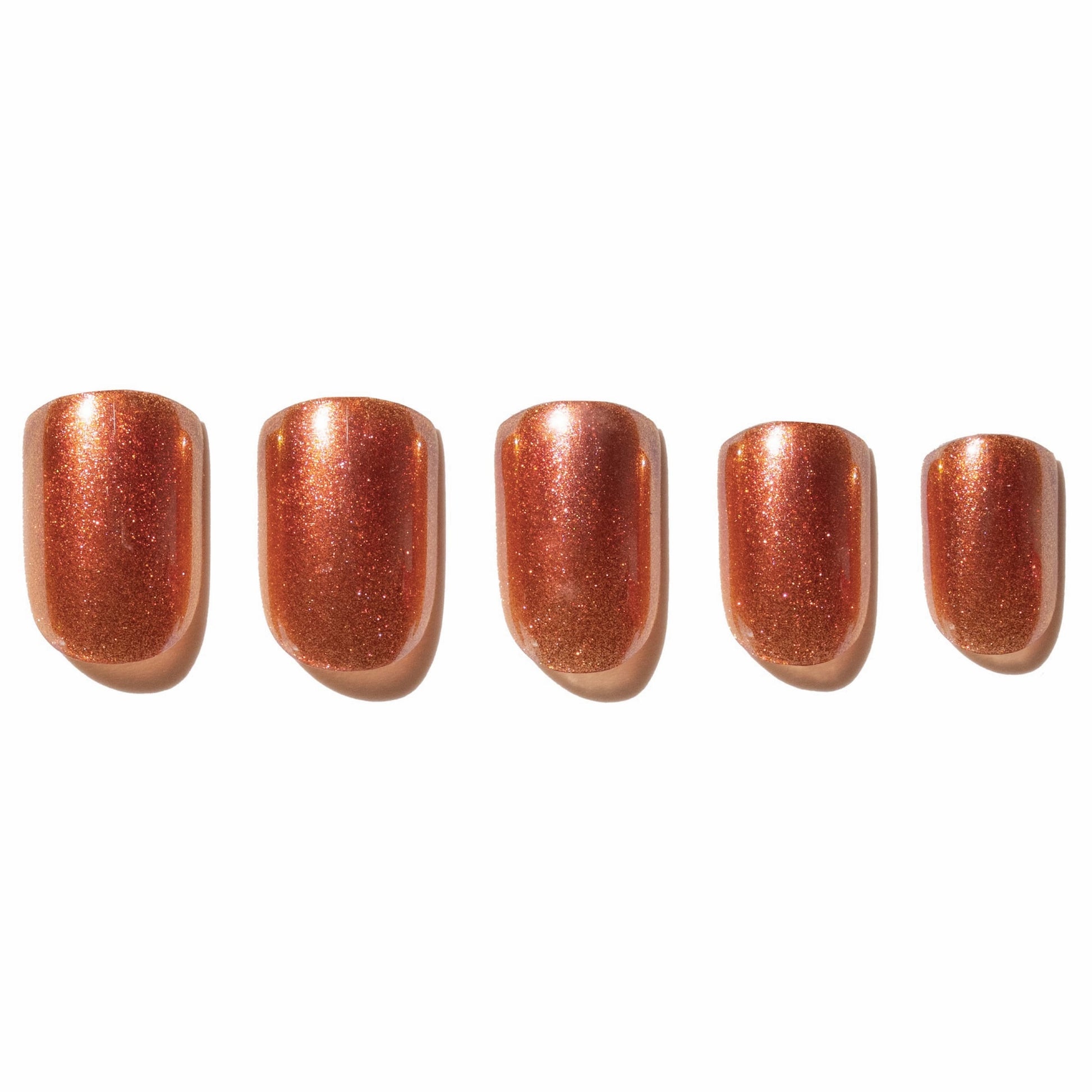 Set of five rose gold press on nails on a white background