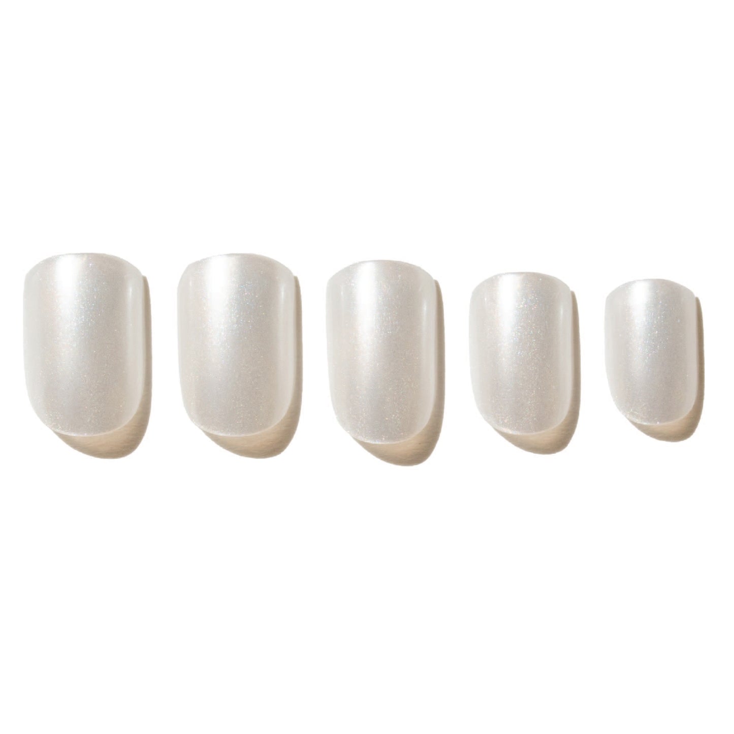 Five white press on nails on a white background