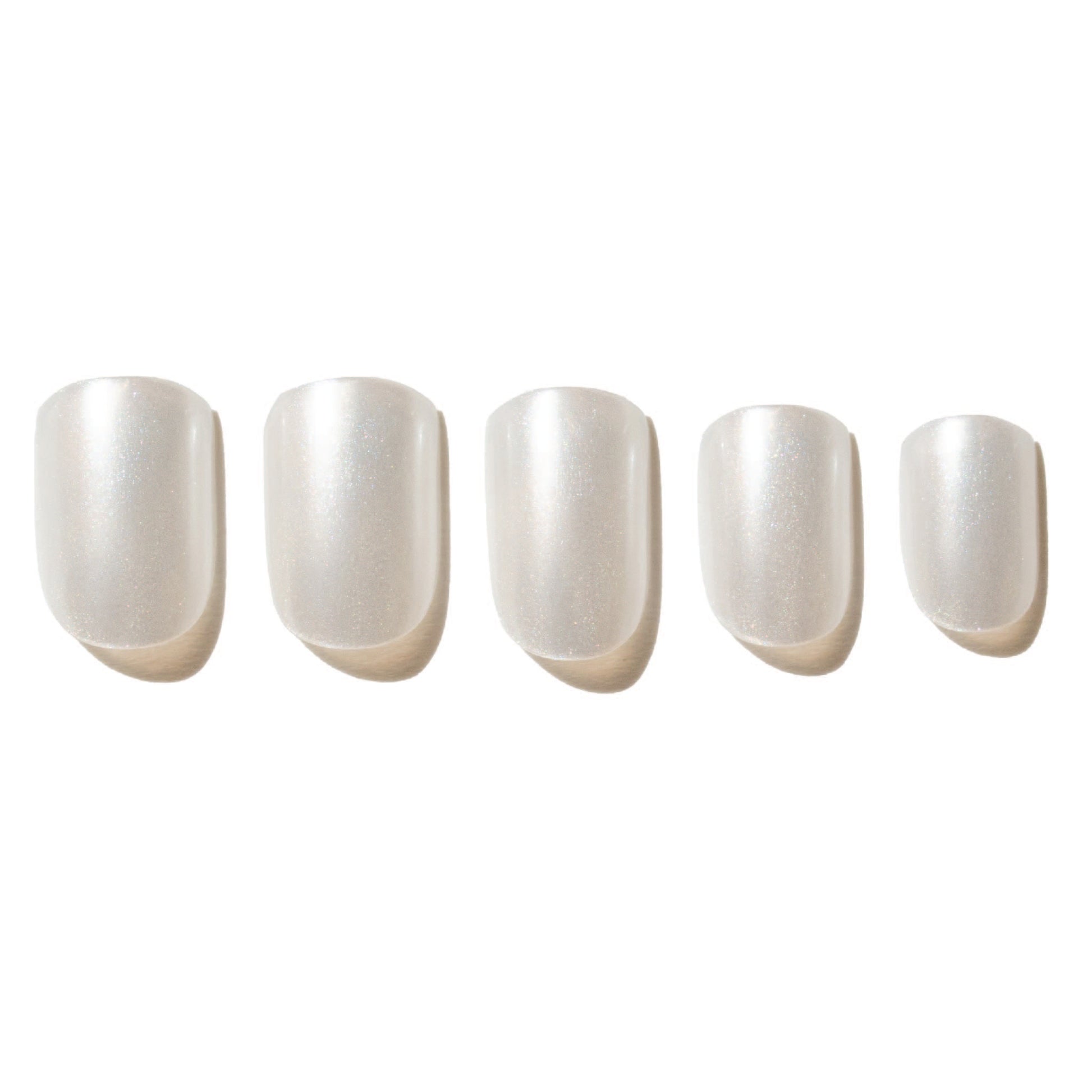 Five white press on nails on a white background